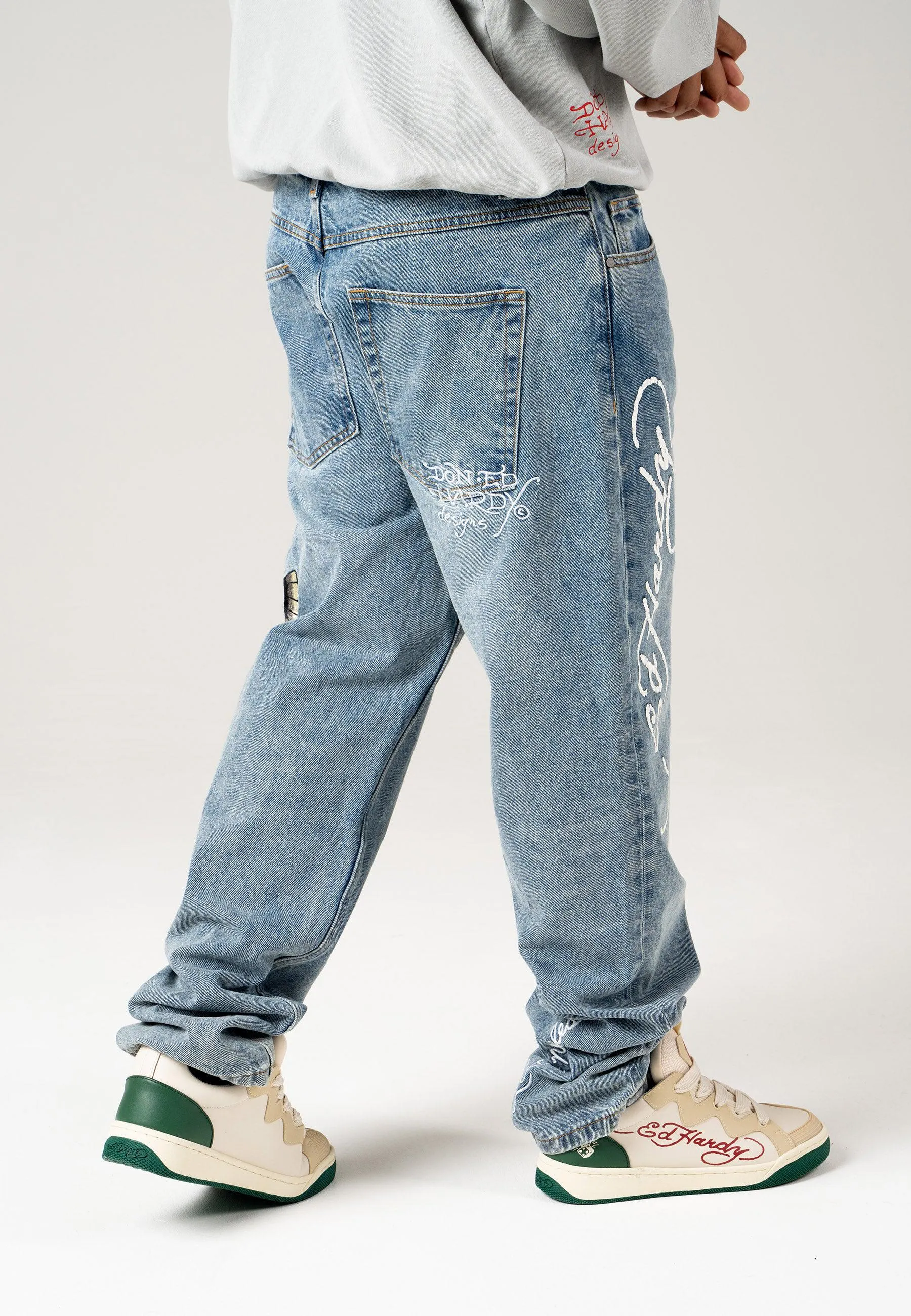 Mens Golden-Eagle Tattoo Graphic Denim Trousers Jeans - Bleach